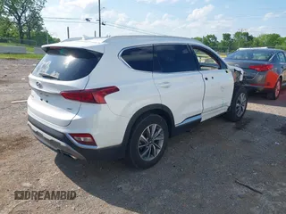2020 Hyundai Santa Fe SEL with VIN 5NMS3CAD0LH254203, listed as a IAAI auction lot 42119602 with 104,158 mi miles. Bid and sale history available at carsss.com. Image 4.