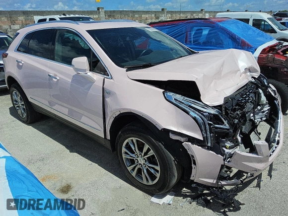 2023 Cadillac XT5 FWD Premium Luxury z VIN 1GYKNCR45PZ160005, wystawiony jako Copart lot #59147325 z przebiegiem 70 322 mil mil oraz Szkoda całkowita • Salvage title. Historia ofert i sprzedaży dostępna na DreamBid. Obrazek 4.