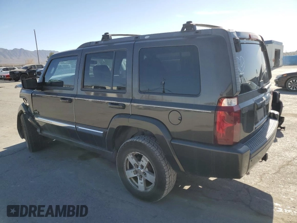 2006 Jeep Commander with VIN 1J8HH48K26C263986, listed as a Copart auction lot 84712294 with 216,923 mi miles and Salvage title. Bid and sale history available at DreamBid. Image 2.