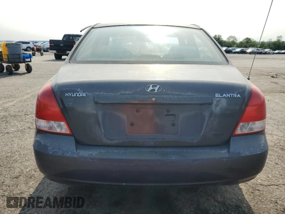 2002 Hyundai Elantra GLS with VIN KMHDN45D22U384067, listed as a Copart auction lot 59384065 with 131,236 mi miles and Salvage title. Bid and sale history available at DreamBid. Image 6.