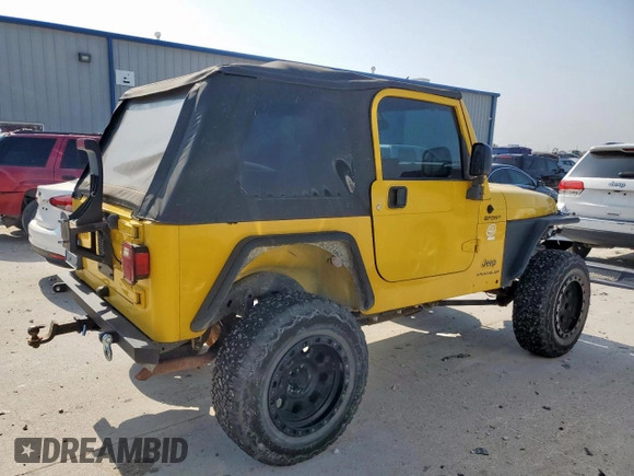 2003 Jeep Wrangler Sport with VIN 1J4FA49S43P369906, listed as a Copart auction lot 58079235 with 139,547 mi miles and Salvage title. Bid and sale history available at DreamBid. Image 3.
