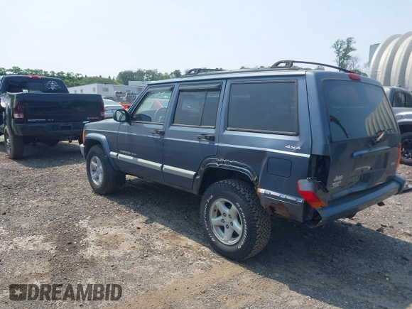2001 Jeep Cherokee Sport z VIN 1J4FF48S51L531033, wystawiony jako IAAI lot #42423910 z przebiegiem 90 438 mil mil oraz . Historia ofert i sprzedaży dostępna na DreamBid. Obrazek 3.