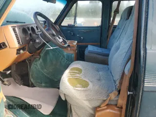 1991 GMC Vandura z VIN 1GDEG25K6M7504729, wystawiony jako Copart lot #71146614 z przebiegiem 181 800 mil mil oraz Tytuł czysty. Historia ofert i sprzedaży dostępna na DreamBid. Obrazek 7.
