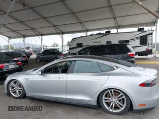2014 Tesla Model S 60 with VIN 5YJSA1H12EFP32213, listed as a IAAI auction lot 42194085 with 56,071 mi miles and . Bid and sale history available at DreamBid. Image 15.