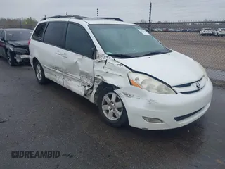 2010 Toyota Sienna XLE with VIN 5TDYK4CC1AS330349, listed as a IAAI auction lot 41607065 with 258,145 mi miles and . Bid and sale history available at carsss.com. Image 1.
