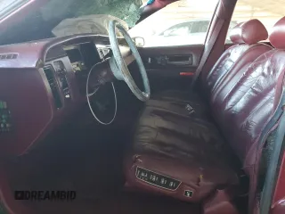 1993 Cadillac Fleetwood z VIN 1G6DW5270PR704750, wystawiony jako Copart lot #88751055 z przebiegiem Nie podano mil oraz Szkody całkowita. Historia ofert i sprzedaży dostępna na DreamBid. Obrazek 7.