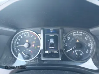 2021 Toyota Tacoma SR z VIN 3TYCZ5AN7MT017377, wystawiony jako IAAI lot #42285326 z przebiegiem 91 657 mil mil oraz . Historia ofert i sprzedaży dostępna na DreamBid. Obrazek 7.