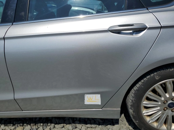 2013 Ford Fusion SE Hybrid with VIN 3FA6P0LU9DR217546, listed as a Copart auction lot 66597775 with Not provided miles and Clean title. Bid and sale history available at DreamBid. Image 12.