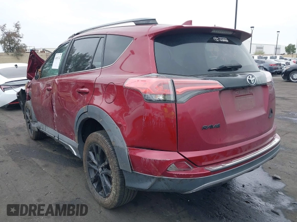2018 Toyota RAV4 XLE with VIN 2T3RFREVXJW699293, listed as a IAAI auction lot 41881742 with Not Provided miles and . Bid and sale history available at DreamBid. Image 3.
