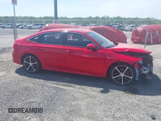 2024 Honda Civic Touring with VIN 2HGFE1F97RH302435, listed as a IAAI auction lot 42155203 with 23,494 mi miles and . Bid and sale history available at DreamBid. Image 14.