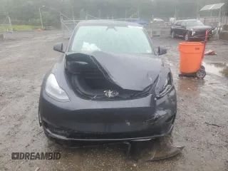 2024 Tesla Model Y z VIN 7SAYGDEDXRF076893, wystawiony jako Copart lot #57966515 z przebiegiem 9 200 mil mil oraz Szkoda całkowita • Salvage title. Historia ofert i sprzedaży dostępna na DreamBid. Obrazek 5.