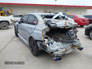 2016 Subaru WRX with VIN JF1VA1B6XG9834590, listed as a IAAI auction lot 42148646 with 1 mi miles. Bid and sale history available at carsss.com. Image 3.
