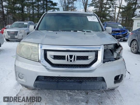 2011 Honda Pilot EX-L with VIN 5FNYF3H6XBB041672, listed as a IAAI auction lot 41337038 with 205,741 mi miles and . Bid and sale history available at DreamBid. Image 13.