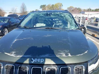 2021 Jeep Compass Limited with VIN 3C4NJDCB7MT599950, listed as a IAAI auction lot 41879491 with 67,282 mi miles and . Bid and sale history available at carsss.com. Image 6.