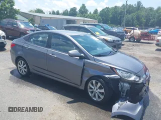 2013 Hyundai Accent GLS with VIN KMHCU4AE2DU582650, listed as a IAAI auction lot 42613000 with 69,724 mi miles and . Bid and sale history available at DreamBid. Image 1.