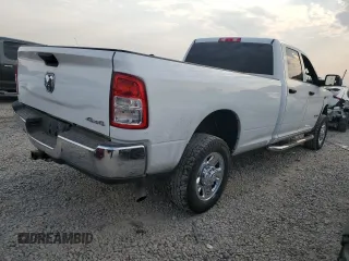 2021 Ram 2500 Tradesman with VIN 3C6UR5HJXMG607601, listed as a Copart auction lot 66101514 with 104,715 mi miles and Salvage Title. Bid and sale history available at carsss.com. Image 3.