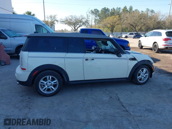2013 MINI Clubman z VIN WMWZF3C54DT491236, wystawiony jako IAAI lot #41663705 z przebiegiem 90 046 mil mil oraz . Historia ofert i sprzedaży dostępna na DreamBid. Obrazek 13.