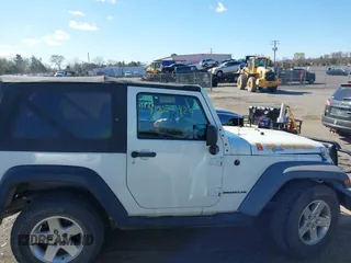 2010 Jeep Wrangler Sport with VIN 1J4GA2D11AL161770, listed as a IAAI auction lot 41875929 with 164,954 mi miles and . Bid and sale history available at carsss.com. Image 13.