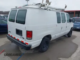 2009 Ford Econoline Cargo Commercial with VIN 1FTNE14W49DA93428, listed as a IAAI auction lot 41641859 with 220,630 mi miles and . Bid and sale history available at DreamBid. Image 4.