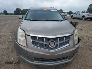 2011 Cadillac SRX Luxury Collection z VIN 3GYFNAEY9BS539691, wystawiony jako Copart lot #57487995 z przebiegiem 179 475 mil mil oraz Czysty tytuł • Clean title. Historia ofert i sprzedaży dostępna na DreamBid. Obrazek 5.