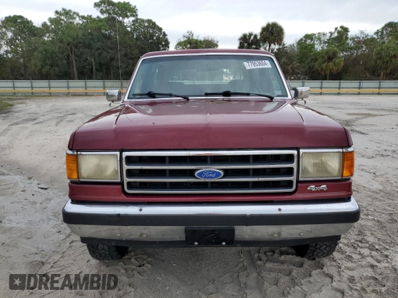 1990 Ford Bronco Custom with VIN 1FMEU15H2LLA70449, listed as a Copart auction lot 77953604 with 12,519 mi miles and Salvage Title. Bid and sale history available at DreamBid. Image 5.