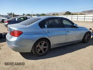 2015 BMW 3 Series 328i with VIN WBA3C1C55FK118931, listed as a Copart auction lot 64058985 with 171,332 mi miles and Salvage title. Bid and sale history available at DreamBid. Image 3.