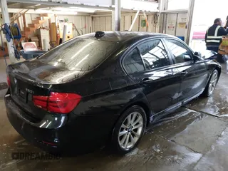 2016 BMW 3 Series 320i with VIN WBA8A9C52GK616953, listed as a IAAI auction lot 41227029 with 73,741 mi miles. Bid and sale history available at carsss.com. Image 4.