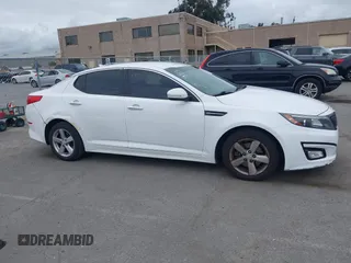 2015 Kia Optima LX with VIN KNAGM4A74F5662579, listed as a IAAI auction lot 42127251 with 144,138 mi miles and . Bid and sale history available at carsss.com. Image 12.