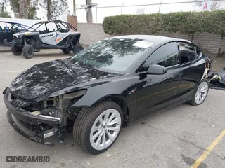 2023 Tesla Model 3 Long Range with VIN 5YJ3E1EB5PF594787, listed as a IAAI auction lot 41477080 with 7,852 mi miles. Bid and sale history available at carsss.com. Image 23.
