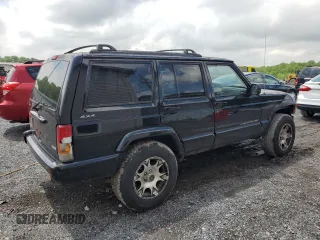 2000 Jeep Cherokee Classic with VIN 1J4FF58S8YL119611, listed as a Copart auction lot 57255685 with 148,908 mi miles and Clean title. Bid and sale history available at DreamBid. Image 3.