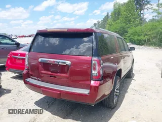 2018 GMC Yukon XL Denali z VIN 1GKS1HKJ6JR312495, wystawiony jako IAAI lot #42177446 z przebiegiem 94 268 mil mil oraz . Historia ofert i sprzedaży dostępna na DreamBid. Obrazek 4.