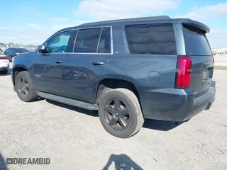 2020 Chevrolet Tahoe LT with VIN 1GNSCBKC4LR246060, listed as a IAAI auction lot 41272902 with 105,417 mi miles. Bid and sale history available at carsss.com. Image 3.