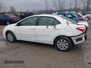 2015 Toyota Corolla L with VIN 5YFBURHE4FP330420, listed as a IAAI auction lot 41059296 with 73,689 mi miles and . Bid and sale history available at DreamBid. Image 15.