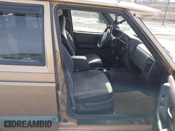 1999 Jeep Cherokee Sport with VIN 1J4FF68S1XL540249, listed as a IAAI auction lot 41660594 with 133,995 mi miles and . Bid and sale history available at DreamBid. Image 5.