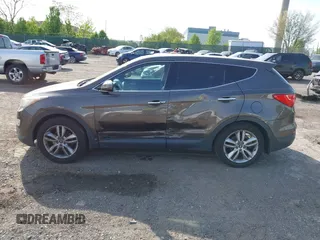 2013 Hyundai Santa Fe Sport z VIN 5XYZW3LA3DG068434, wystawiony jako IAAI lot #42167040 z przebiegiem 140 928 mil mil oraz . Historia ofert i sprzedaży dostępna na DreamBid. Obrazek 15.