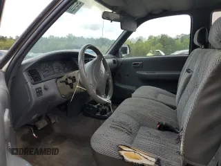 1995 Toyota T100 DX with VIN JT4VD12E2S0009844, listed as a Copart auction lot 51738525 with 357,475 mi miles and Salvage Title. Bid and sale history available at carsss.com. Image 7.