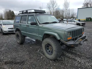 2000 Jeep Cherokee Classic with VIN 1J4FF58S3YL104384, listed as a Copart auction lot 46645415 with 253,730 mi miles and Salvage Title. Bid and sale history available at carsss.com. Image 4.