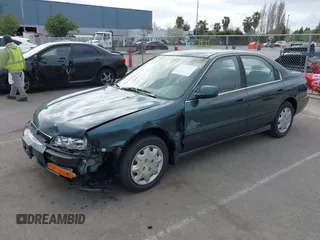 1996 Honda Accord LX with VIN 1HGCD5630TA197512, listed as a IAAI auction lot 41906009 with 79,805 mi miles and . Bid and sale history available at carsss.com. Image 17.