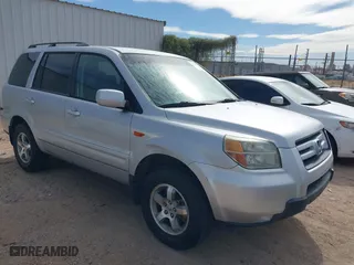 2006 Honda Pilot EX with VIN 2HKYF184X6H519132, listed as a IAAI auction lot 42030952 with 256,094 mi miles. Bid and sale history available at carsss.com. Image 1.