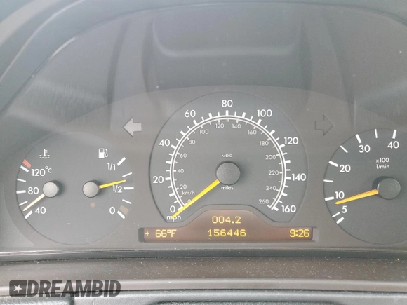 1999 Mercedes-Benz E-Class with VIN WDBJF65H4XA883351, listed as a Copart auction lot 73682964 with 156,446 mi miles and Salvage Title. Bid and sale history available at carsss.com. Image 9.