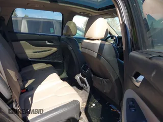 2019 Hyundai Santa Fe Ultimate with VIN 5NMS5CAA6KH075047, listed as a IAAI auction lot 41802407 with 119,063 mi miles and . Bid and sale history available at DreamBid. Image 8.
