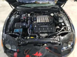 1998 Mitsubishi 3000GT GT z VIN JA3AM84J6WY003097, wystawiony jako Copart lot #83553054 z przebiegiem 270 417 mil mil oraz Szkoda całkowita • Salvage title. Historia ofert i sprzedaży dostępna na DreamBid. Obrazek 11.