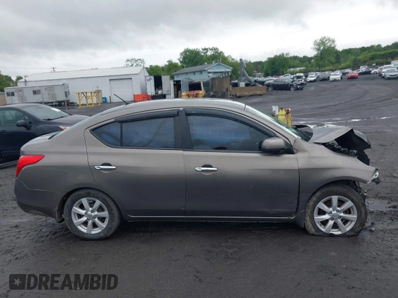 2012 Nissan Versa SV with VIN 3N1CN7AP3CL860116, listed as a IAAI auction lot 42329920 with 105,447 mi miles and . Bid and sale history available at DreamBid. Image 13.