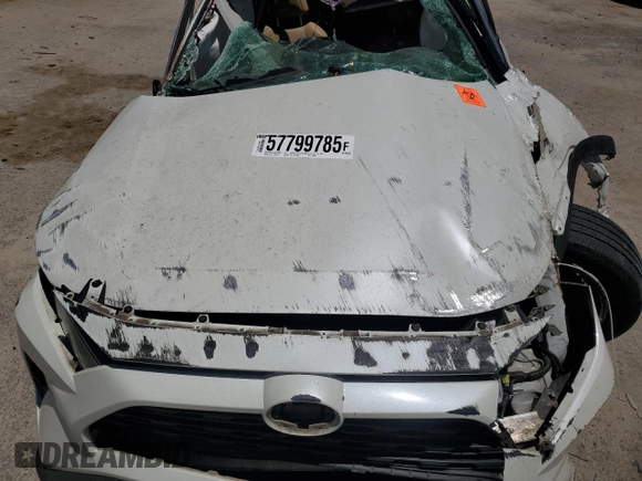 2021 Toyota RAV4 XLE Premium z VIN 2T3A1RFV0MW153326, wystawiony jako Copart lot #57799785 z przebiegiem Nie podano mil oraz Szkoda całkowita • Salvage title. Historia ofert i sprzedaży dostępna na DreamBid. Obrazek 12.