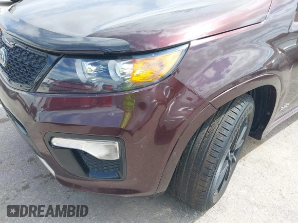 2012 Kia Sorento SX with VIN 5XYKWDA25CG249584, listed as a IAAI auction lot 42008349 with 214,381 mi miles. Bid and sale history available at carsss.com. Image 6.
