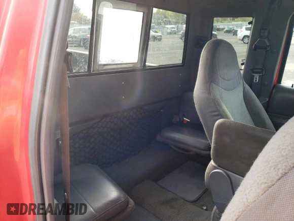 1999 Ford Ranger XL z VIN 1FTZR15V6XTA75656, wystawiony jako Copart lot #47669735 z przebiegiem 167 488 mil mil oraz Szkoda całkowita • Salvage title. Historia ofert i sprzedaży dostępna na DreamBid. Obrazek 10.