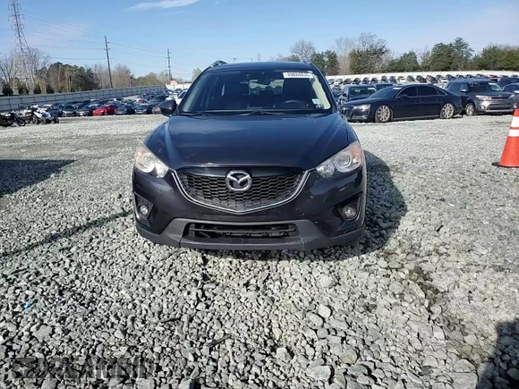 2014 Mazda CX-5 Grand Touring with VIN JM3KE2DY4E0323603, listed as a Copart auction lot 49884835 with 0 mi miles and Salvage Title. Bid and sale history available at carsss.com. Image 12.