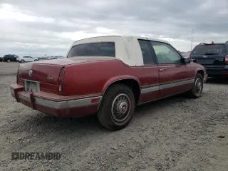 1986 Cadillac Eldorado z VIN 1G6EL5784GU616263, wystawiony jako Copart lot #48741325 z przebiegiem 59 213 mil mil oraz Tytuł czysty. Historia ofert i sprzedaży dostępna na DreamBid. Obrazek 3.