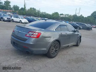 2013 Ford Taurus Limited with VIN 1FAHP2F87DG141383, listed as a IAAI auction lot 40200514 with 158,326 mi miles. Bid and sale history available at carsss.com. Image 4.