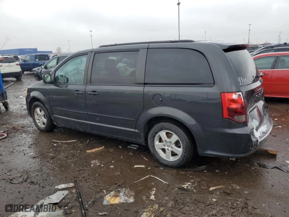 2012 Dodge Grand Caravan SXT with VIN 2C4RDGCG1CR369957, listed as a Copart auction lot 50911285 with 100,856 mi miles and Clean Title. Bid and sale history available at carsss.com. Image 2.